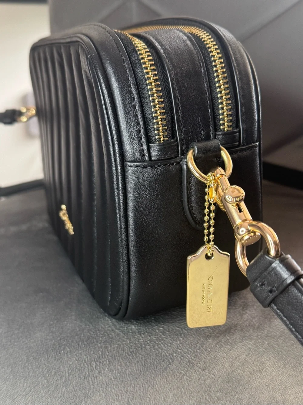 Coach accents quilted